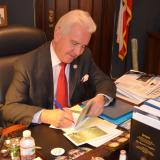 Rep. Costa Signing His Holiday Cards During 2012 Drive
